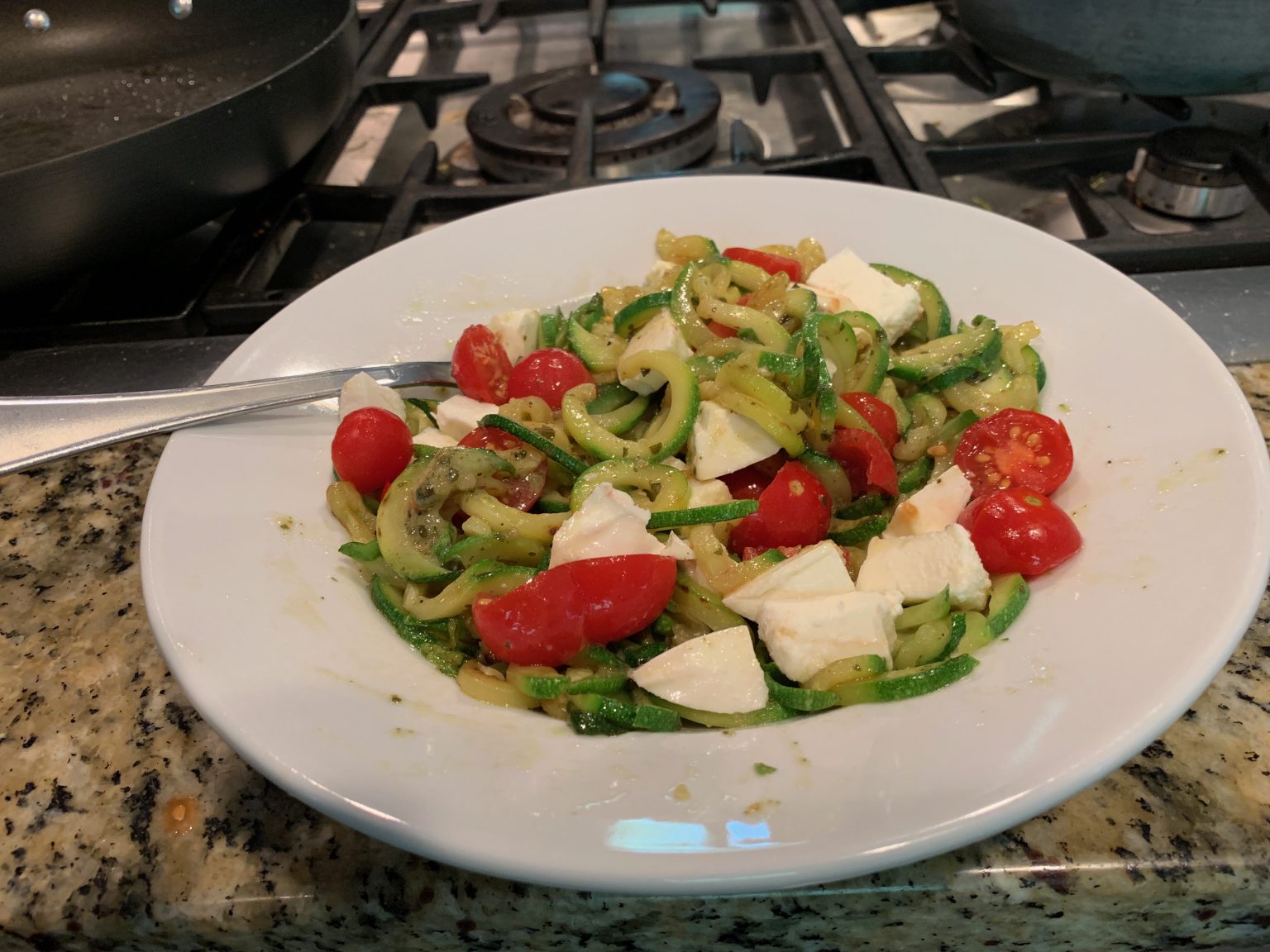 Zoodles with tomatoes and mozzarella Photos from Chris Hardie